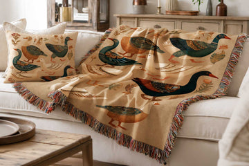 Floral cat woven throw blanket with six cats on a patterned armchair surrounded by flowers