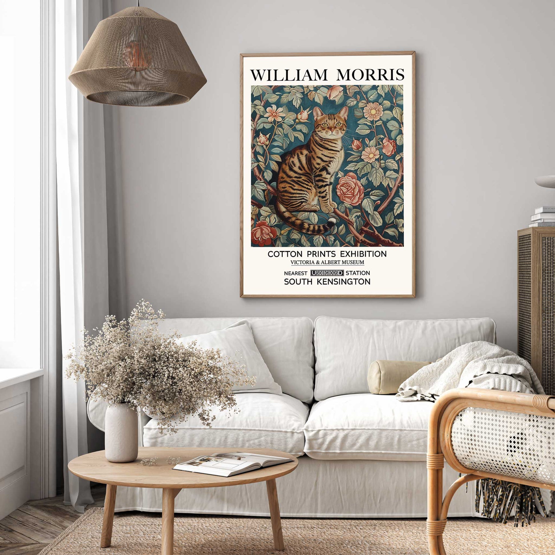 A vintage-inspired wall art print featuring a calico cat surrounded by florals, in William Morris style