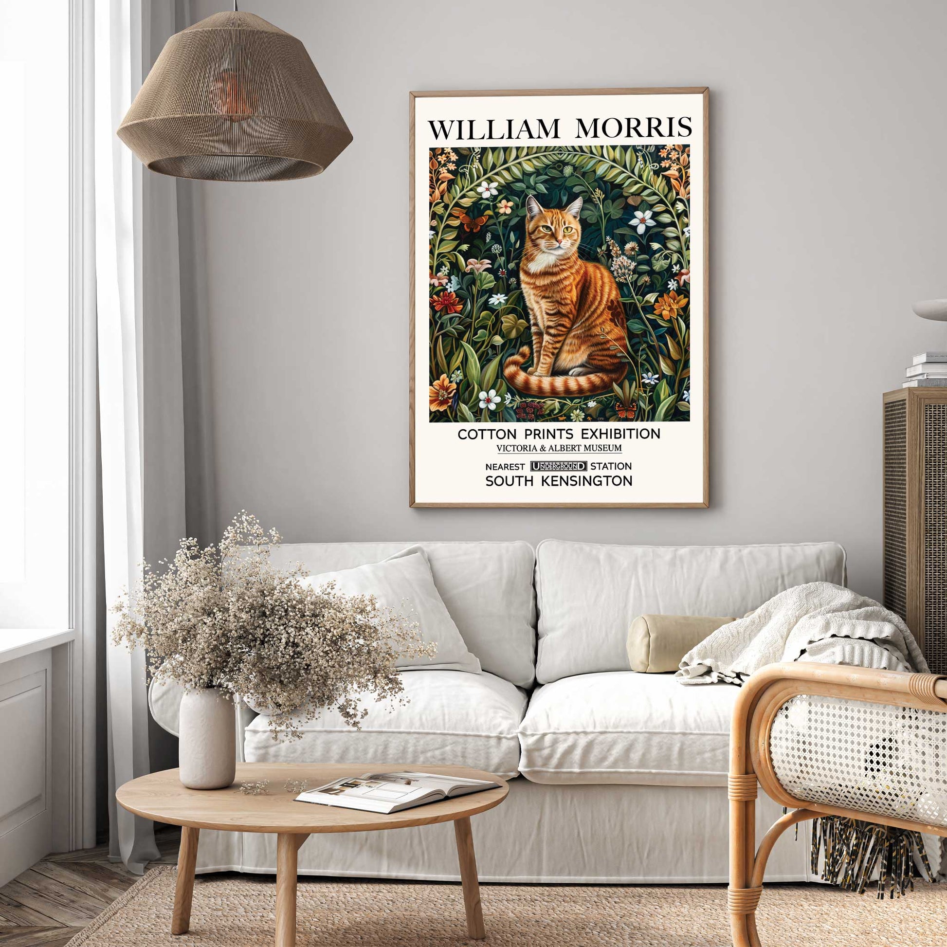 A vintage-inspired wall art print featuring a decorative cat motif surrounded by wildflowers