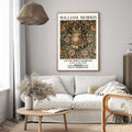 A vintage-inspired wall art print featuring a decorative cat surrounded by floral tapestry.