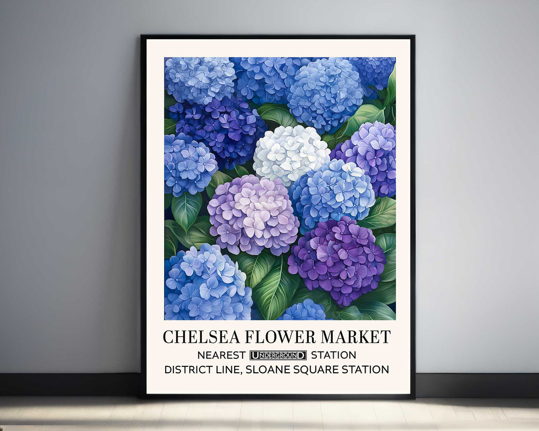 Blue Hydrangea Floral Wall Art Print features clusters of blue and purple hydrangea blooms around a garden path, in a soft, painted style. Framed poster of blue and purple hydrangeas 