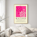 Matisse print with pink botanical leaf shapes on a cream background
