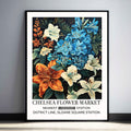 Vintage Lillies Floral Wall Art, blue, white, and orange lily flowers on a dark background.