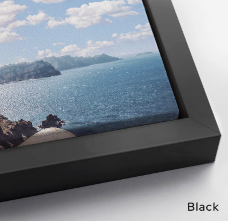 Close up texture detail of a premium gallery wrapped black floating framed canvas print showing high-quality abstract brushstrokes
