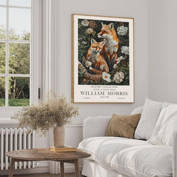 Framed Fox and Cub Wall Art featuring two foxes surrounded by woodland flowers and botanical foliage in the William Morris style. A ready-to-hang print for woodland decor, forest-inspired homes, cottage interiors and wildlife lovers.