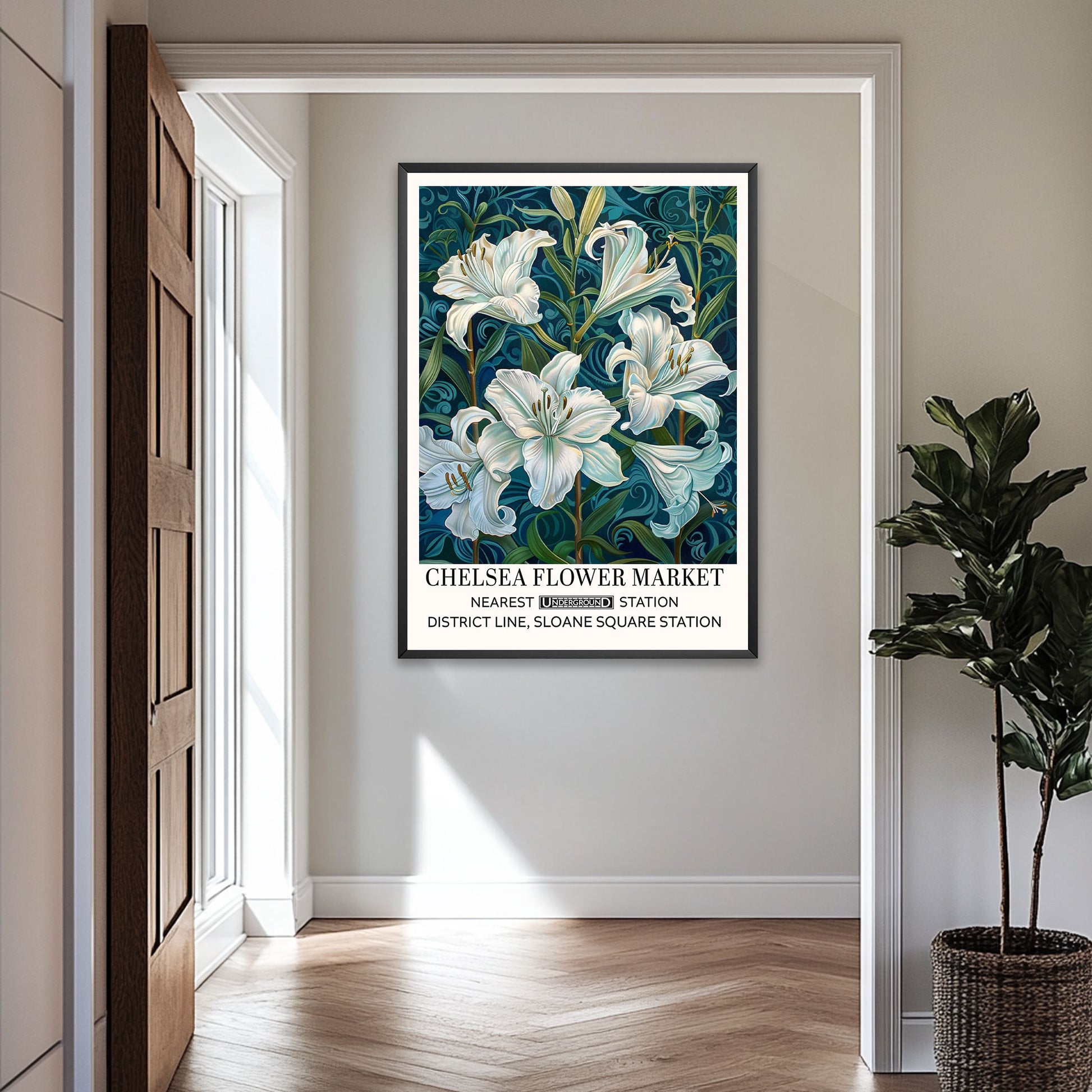 White Lillies Floral Print featuring flowers set against a dark blue background. A vintage-style framed floral artwork on a wall in a room with wooden floor and plant.