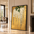 White wisteria canvas wall art with cascading white flowers and green leaves on a rich gold-coloured background.