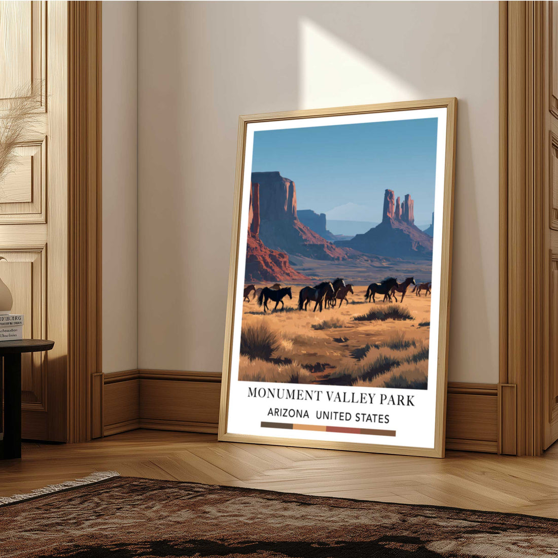 Framed artwork of Monument Valley with horses and desert landscape