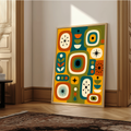 Mid Century Atomic Design Print with a pattern featuring geometric shapes leaf patterns and starburst designs in burnt orange and forest green on a colour blocked background.