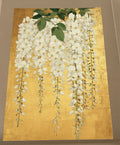 White wisteria wall art print with cascading white flowers and green foliage on a rich gold-coloured background.