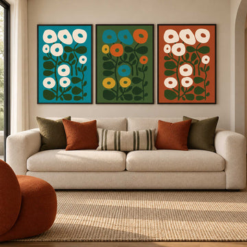 

70s Scandinavian floral wall art set of 3 with mid century modern folk flowers in teal, green, burnt orange and cream