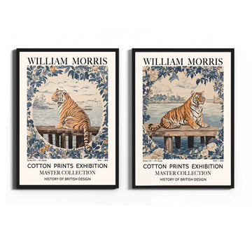 Two framed William Morris art prints side by side, featuring a tiger on a dock with decorative floral borders and text reading 'William Morris' and 'Cotton Prints Exhibition Master Collection'.