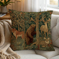 throw pillow with a vintage-style woodland print featuring a fox, bear, deer, and rabbit, styled on a cream tufted sofa with a beige knit throw blanket.